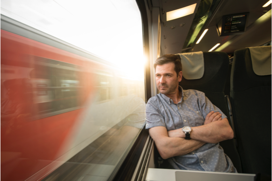 A passanger seated on the train